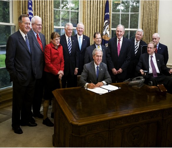 President George W. Bush signs the ADA Amendments Act, September 2008.